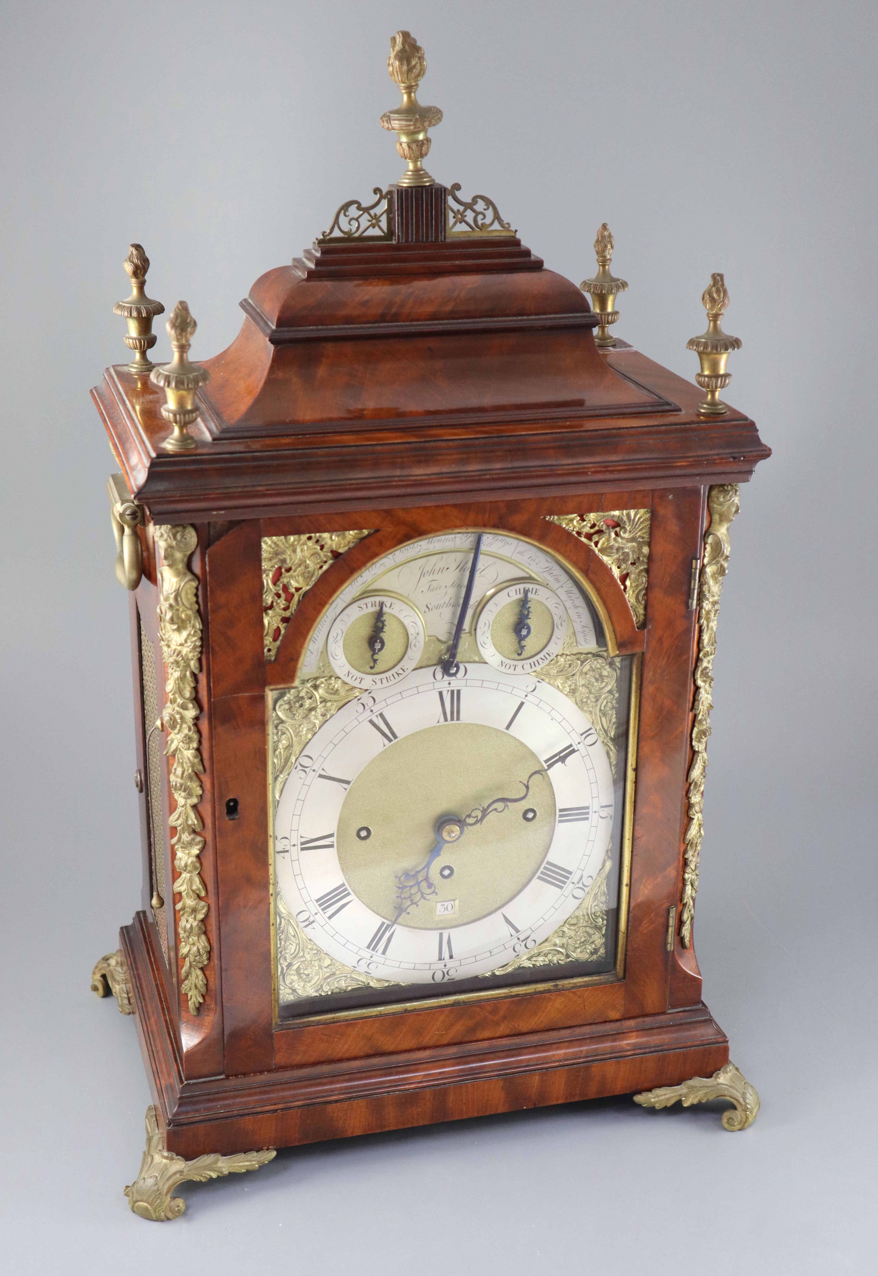 A good George III mahogany musical table clock playing six tunes, John Hovil, Fair Street, London